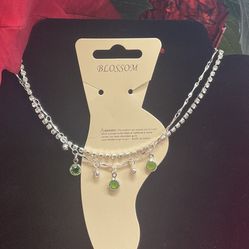 Silver anklet bracelet with green stones and zirconia