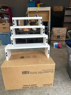2 different sets of floating shelves