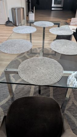 CB2 Chrome glass dining table and chairs