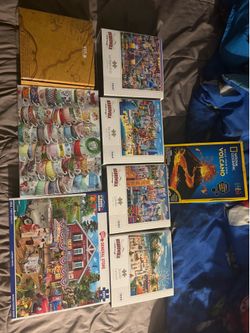 Lot of 1000-Piece Puzzles and National Geographic Kit (All Together)