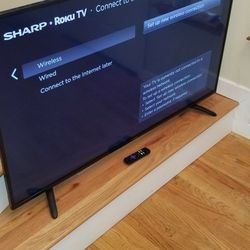 NEW cond  SHARP  55 INCHES  SMART TV. WORKS EXCELLENT. IN THE BOX 