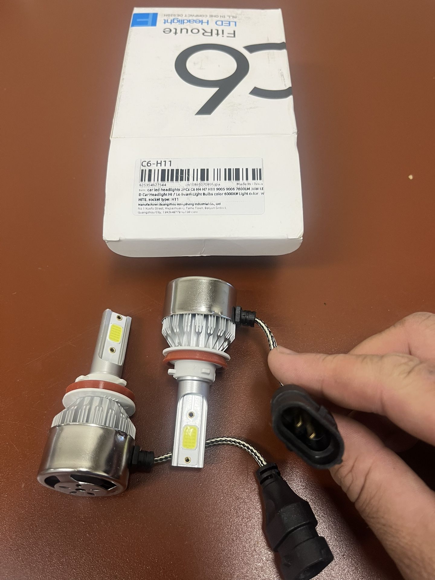 * Product Name: FitRoute C6 LED Headlight Bulbs * Model/Socket Type (As Labeled on Box): C6-H11 * Components Shown: * One partially open white p