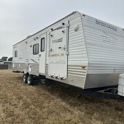 2009 Springdale By Keystone 29’ With Toy hauler 