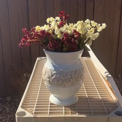 White Vase With Fake Flowers In It