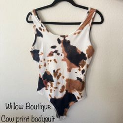 Cow print Bodysuit Size Large 