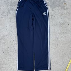 Navy and white Adidas track pants with elastic waistband size XL 