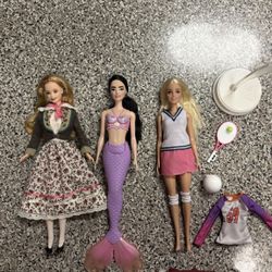 3 Barbie dolls
