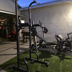  marcy bench with bar and weights also a power bar for pull ups and dips 
Gym Equipment 