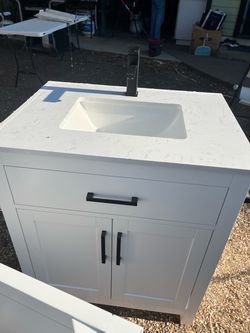 White Bathroom Vanity with Marble Top and Faucet