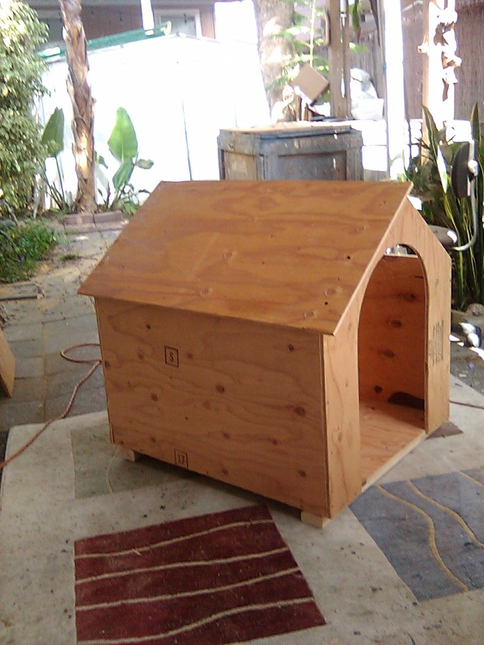 New unpainted wood dog house