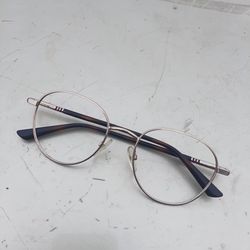 Gucci round metal rimmed glasses rim