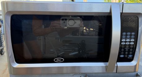 Oster countertop microwave oven Model OZGF1301