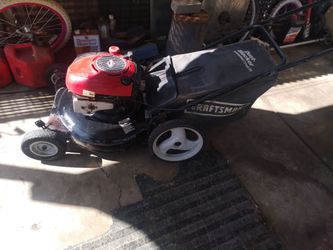 Craftsman push lawn mower runs good $100 firm