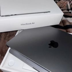 Apple MacBook Air 13.3 inch Laptop - Sliver M1 Chip, Built for Apple Intelligence, 8GB RAM, 256GB storage
