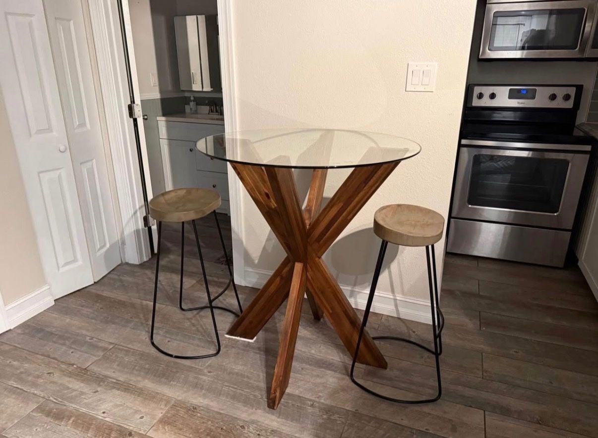Glass top Table With Wood Base And Stools. Bar Height