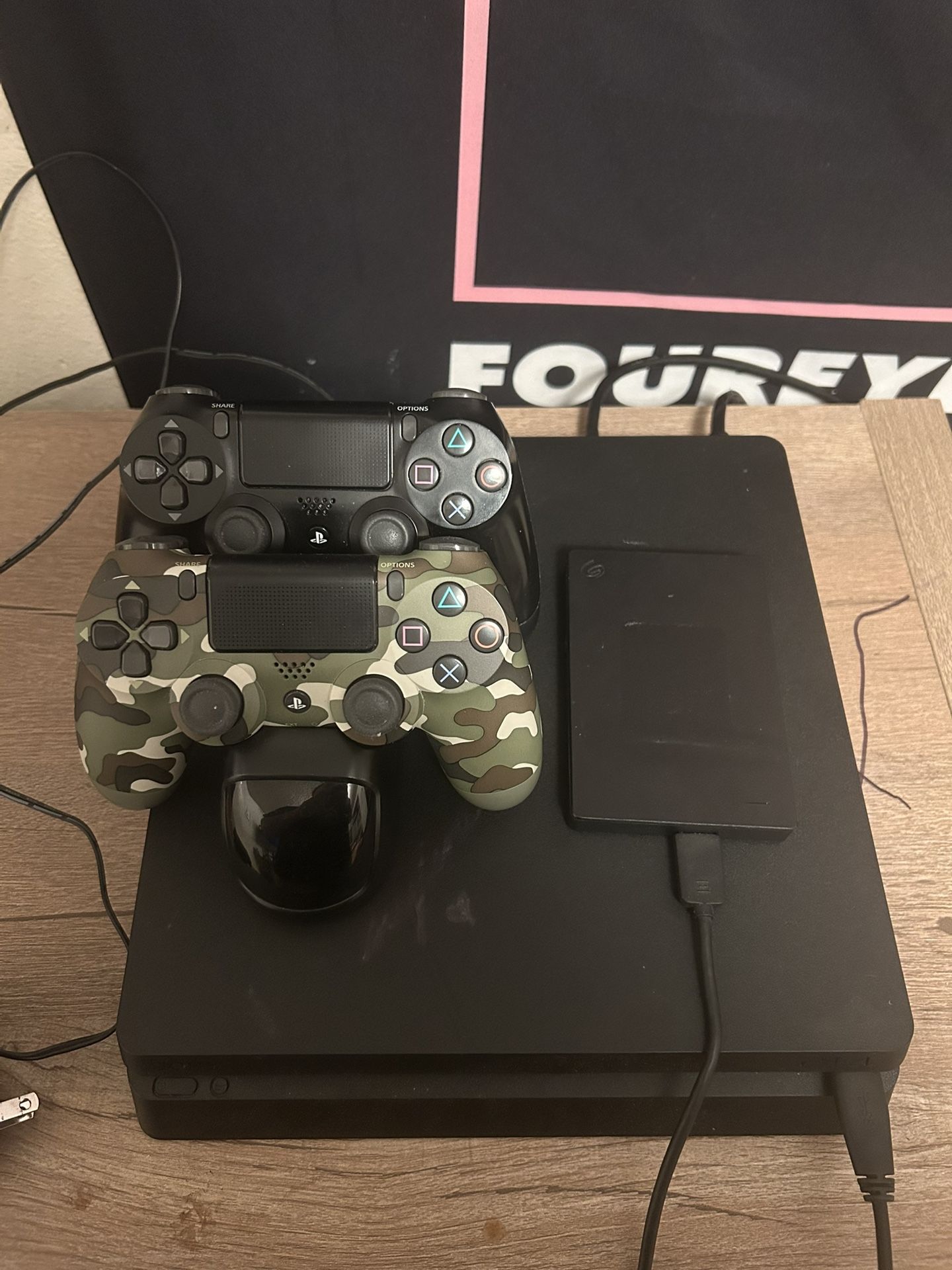 ps4 slim with 2 controllers and dual controller charger