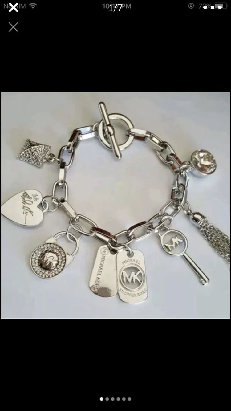 Mk Michael kors charms silver tone white gold tone bracelet bundle
