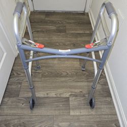 Foldable 2 button walker with wheels. 