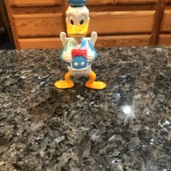 Vintage Disney Walt Disney Productions Donald Duck Hard Rubber Figure 4 Inches Tall . Preowned some minor paint wear due to age.