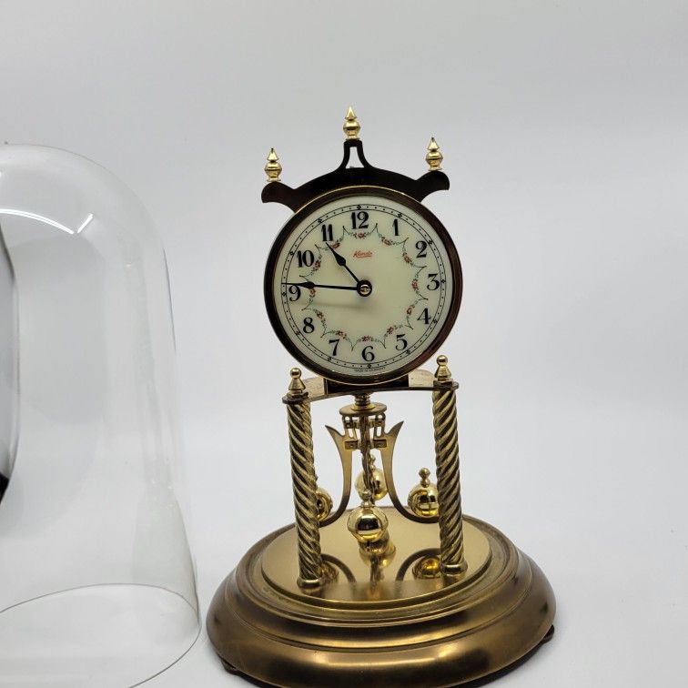 Vintage German Kundo Floral 400 Day Kieninger & Obergfell Torsion 
Anniversary mantel clock. Made in West Germany. Glass dome
Clock prior to listing w