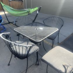 Rod, iron table and chairs