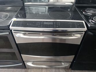 GE Profile stainless steel induction glass-top slide-in range - Free delivery