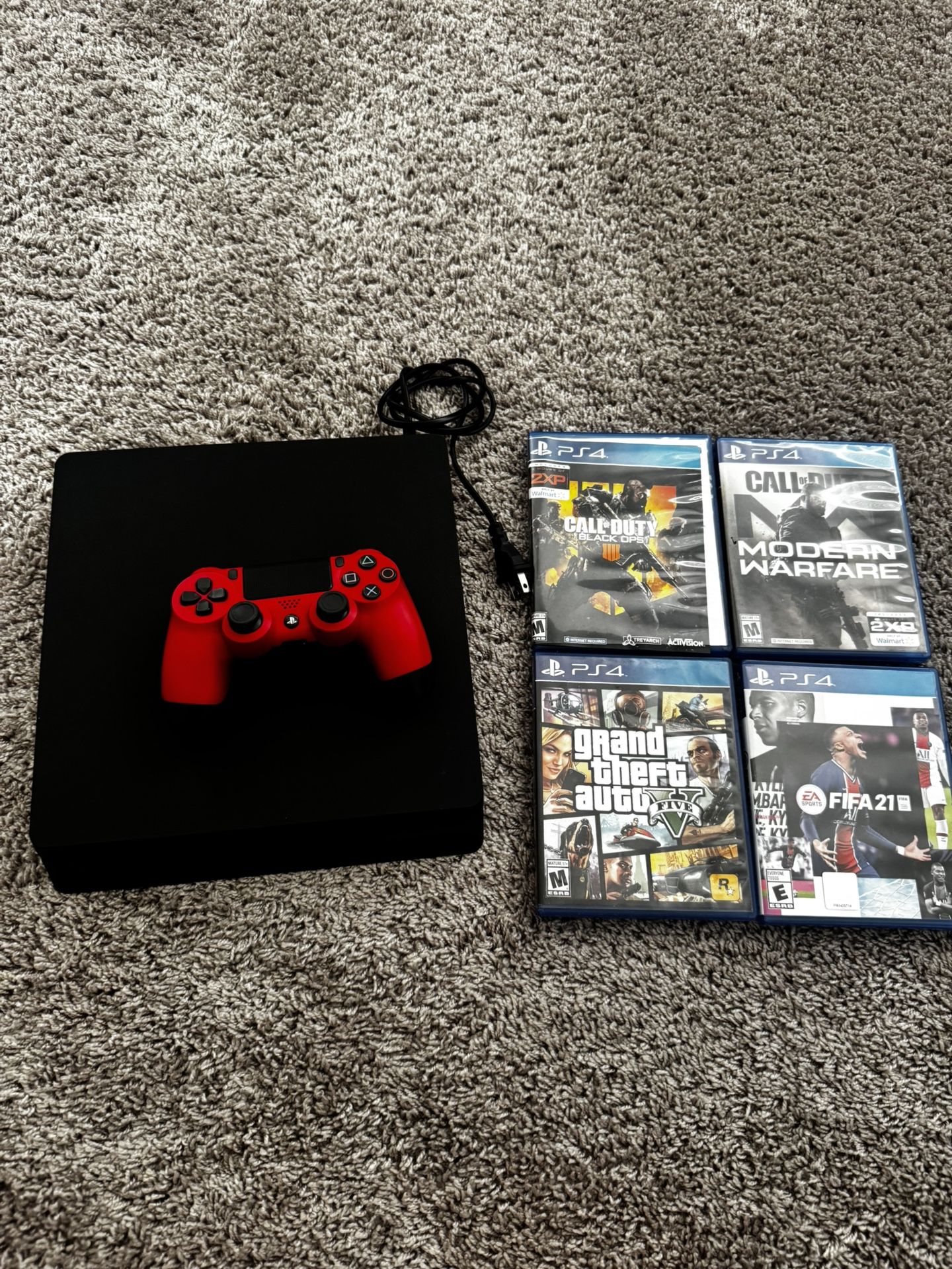 Used PS4 Console – Includes Controller + 4 Games