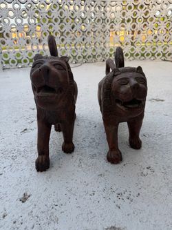 Pair of Carved Wooden Lion Figurines