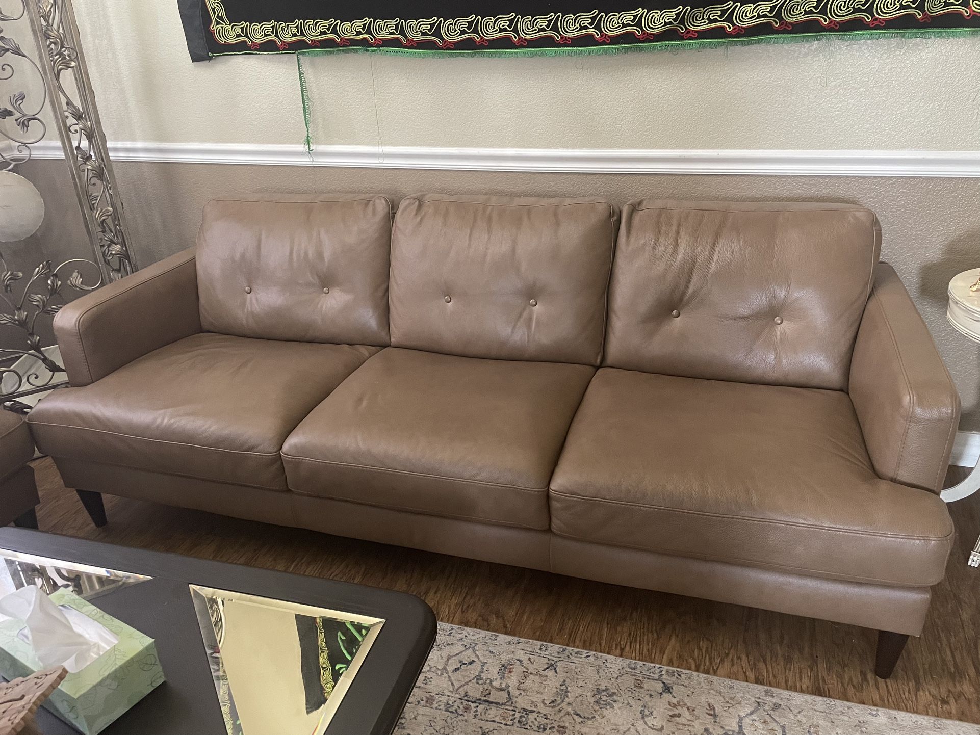 2 Natuzzi Sofas