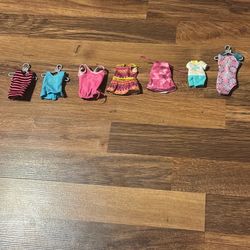 Child’s Clothes Of Barbies 