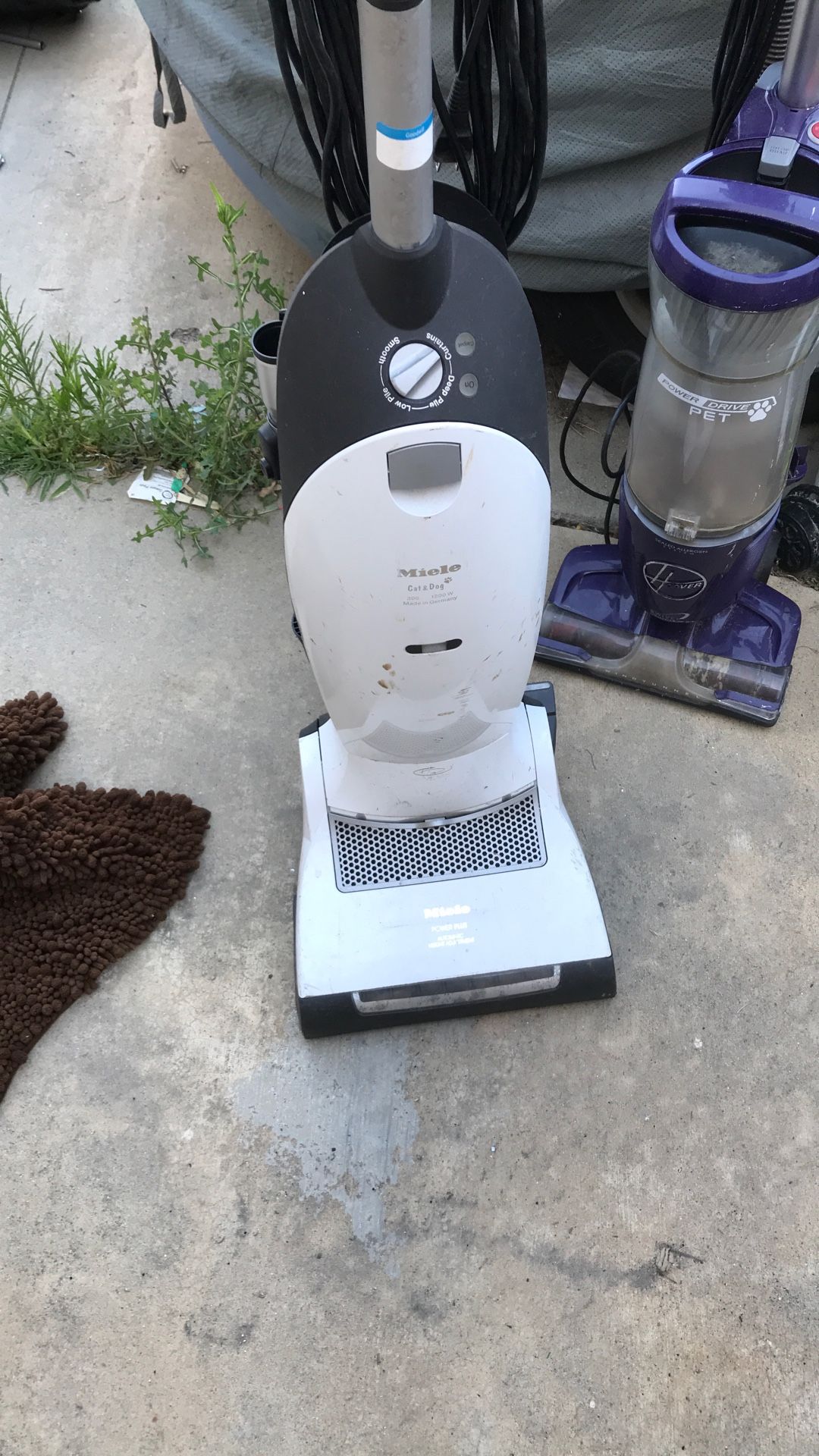 Various House Cleaning Vacuums And Carpet Cleaners