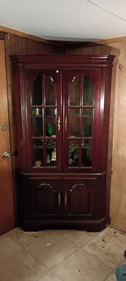 China cabinet that fits in the corner