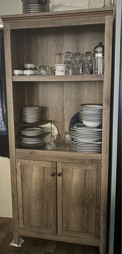 Tall Wood-Tone Bookcase with Cabinet Doors