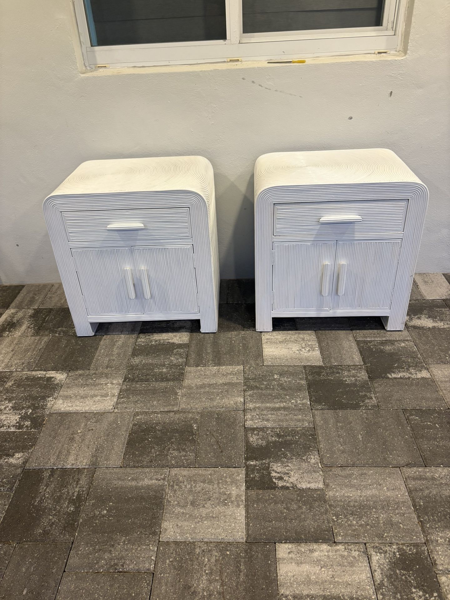 White bedside tables