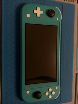 Turquoise SWITCH LITE W/ FREE MYSTERY GAME