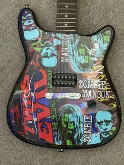 SIGNED: Rob Zombie And Marilyn Manson Epiphone Guitar