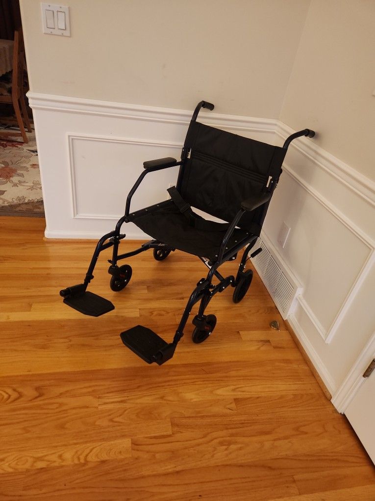 Transport Chair 19" Seat Width, Footrests, Holds 300lbs