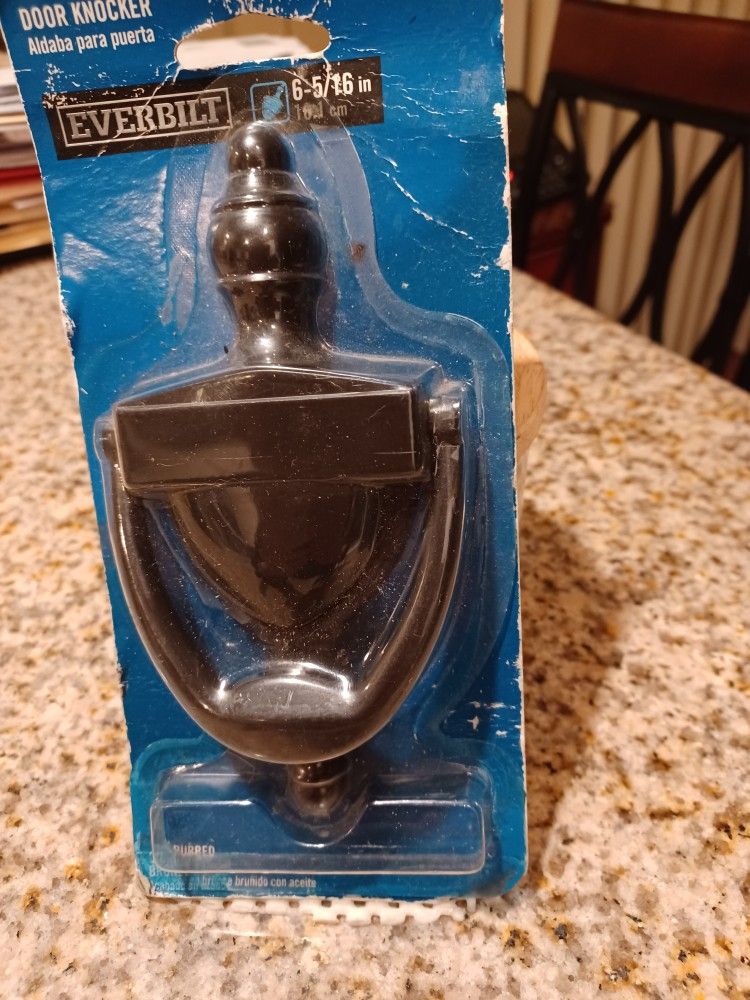 EVERBILT DOOR KNOCKER NEW BLACK. SIZE 3.5"X6.5" $10.