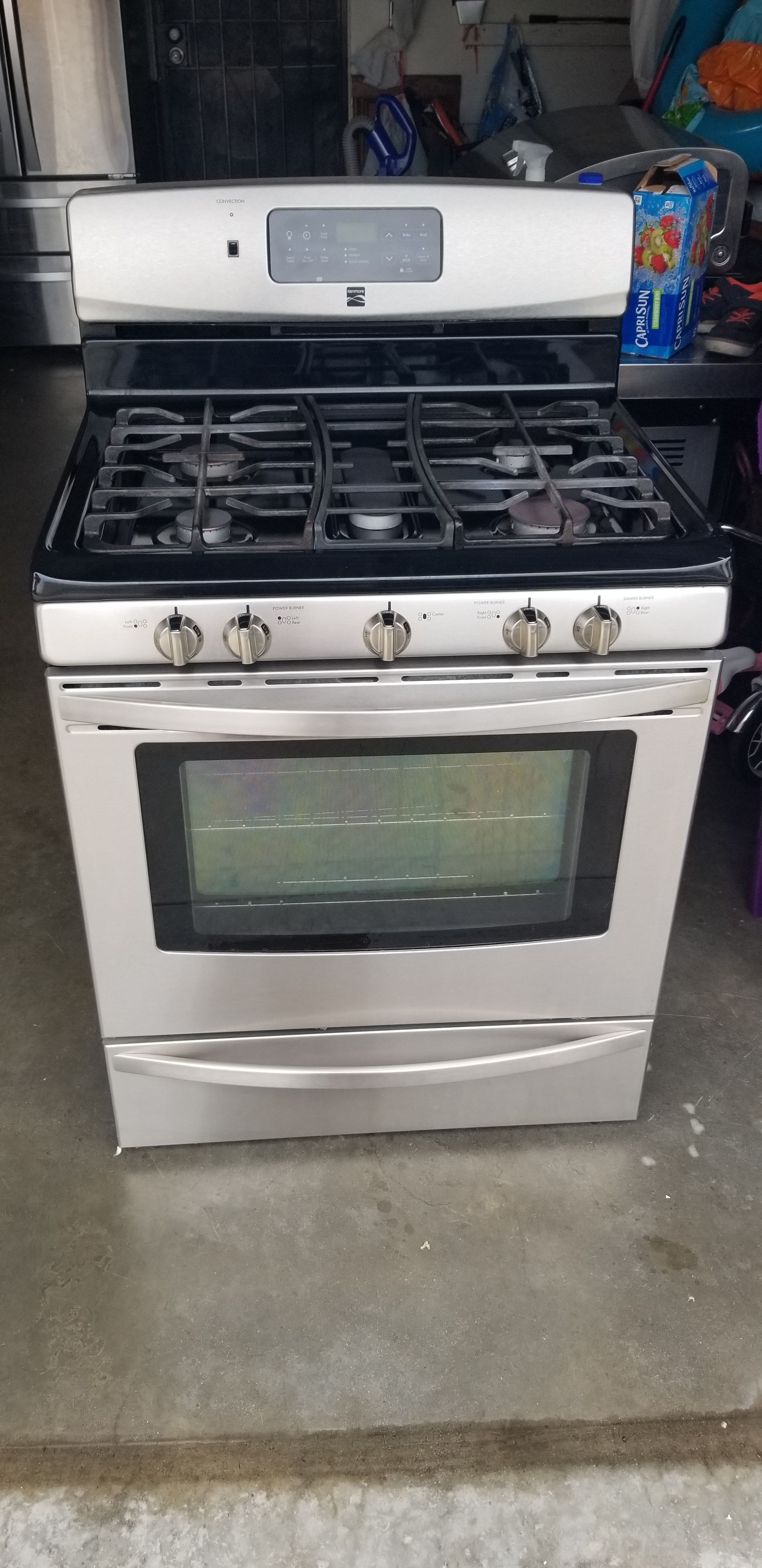 KENMORE STOVE, DISHWASHER AND MICROWAVE.