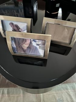 Three silver frames