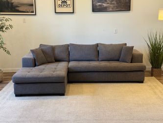 Gray sectional couch delivery available