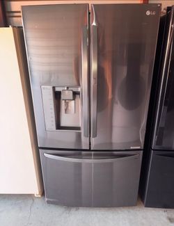 LG Dark Stainless Steel Refrigerator And Freezer
