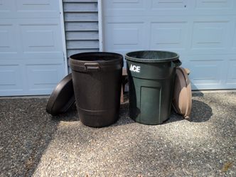 FREE Rubbermaid and Gotta garbage cans. Both have small leaks at the bottom.