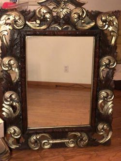 Antique “European imported” gold wall mirror