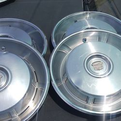 Early '70s Cadillac OEM Hubcaps In Good Condition