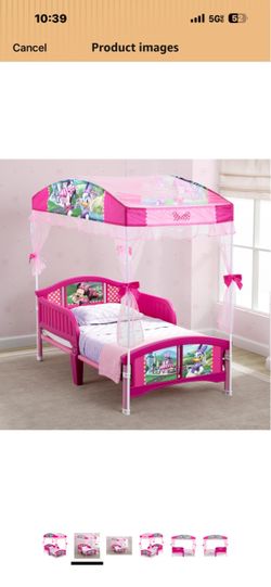 Delta Minnie canopy toddler bed with mattress