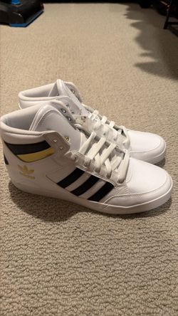 Men’s white adidas shoes