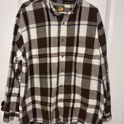 Bass Pro Shops men's brown, white, and tan plaid flannel button-down shirt with a chest pocket