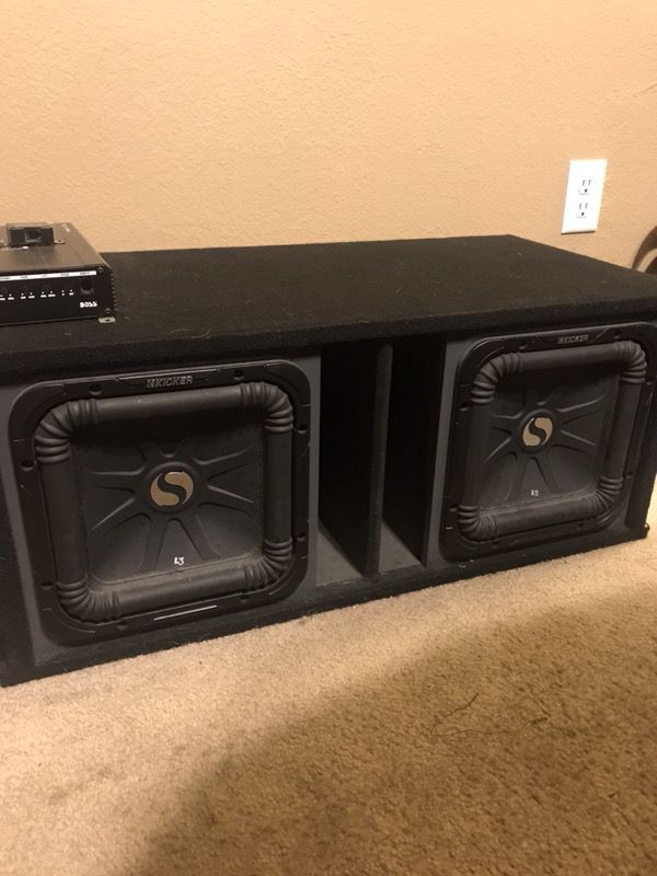 Two kicker L3 Solobaric subwoofers and 2500 watt amp