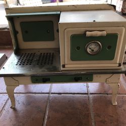 Antique Little Lady Toy Range. 